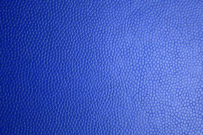 Blue textured leather material surface