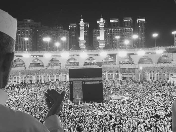 Kaaba in Mecca at Night with Praying Crowd