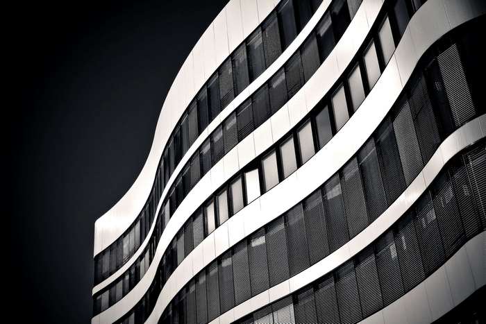 Modern architecture with curved facade and glass windows