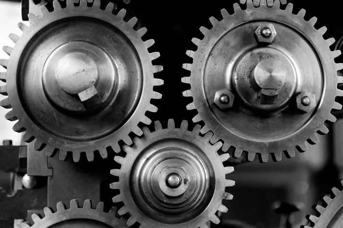 Close-up of interlocking metal gears in a machine