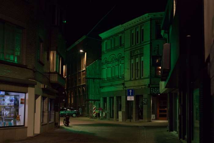 Street at night with green lights
