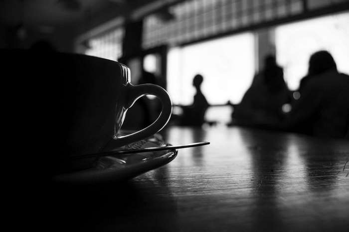 Black and white coffee cup in a cafe