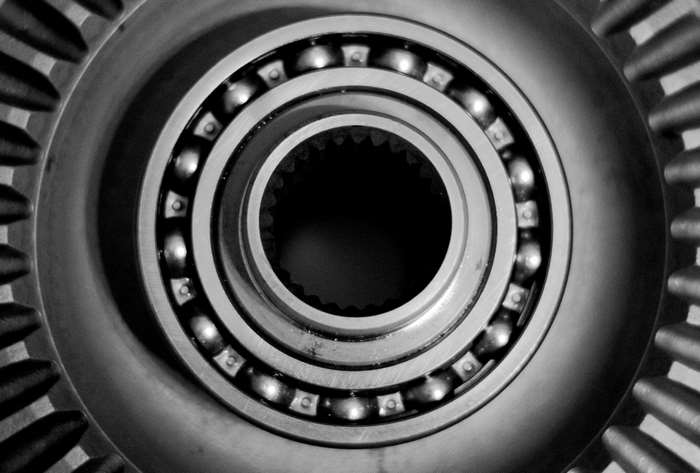 Close-up of a metal bearing with gear teeth
