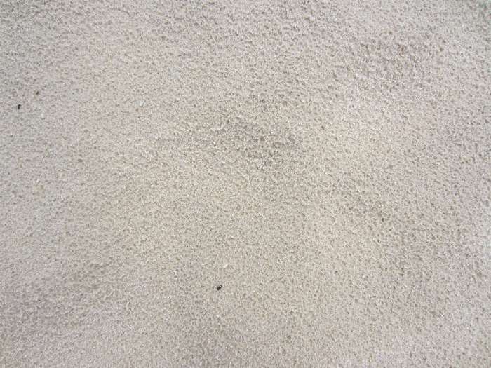 Close-up of white sand texture 4K