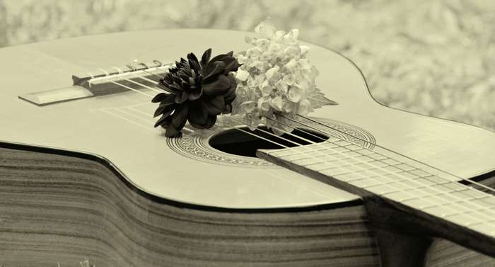 Acoustic guitar with flowers