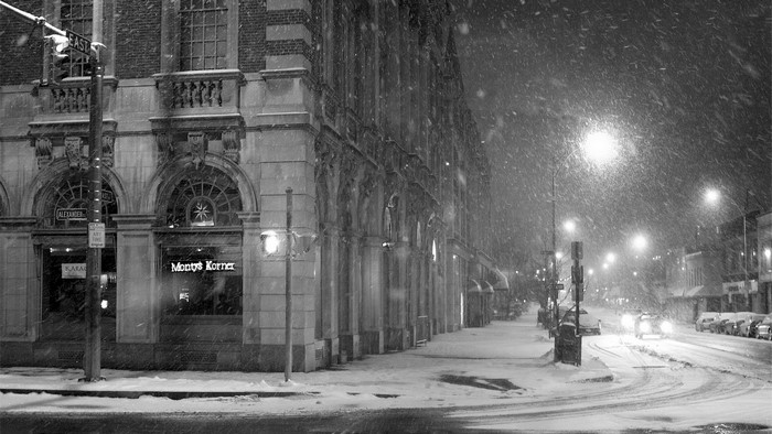 Snowy City Street at Night