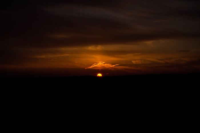 Sunset over dark landscape 4K