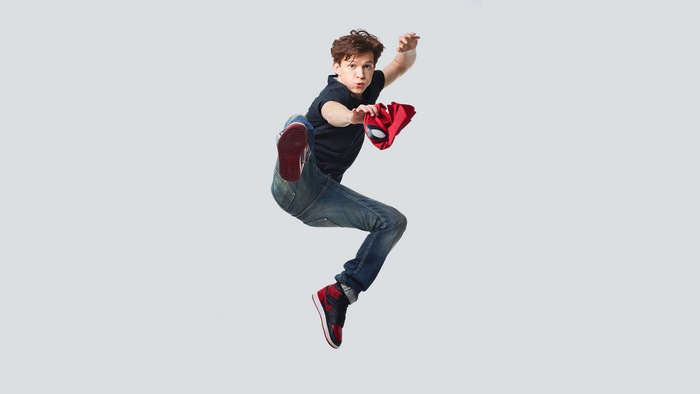 Tom Holland as Spider-Man in a jump
