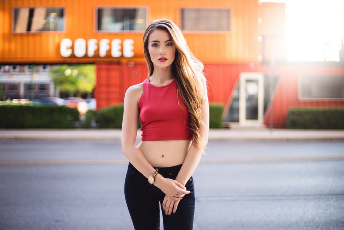 Young Woman in Red Crop Top by Coffee Shop
