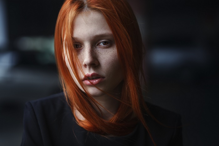 Woman with red hair and freckles