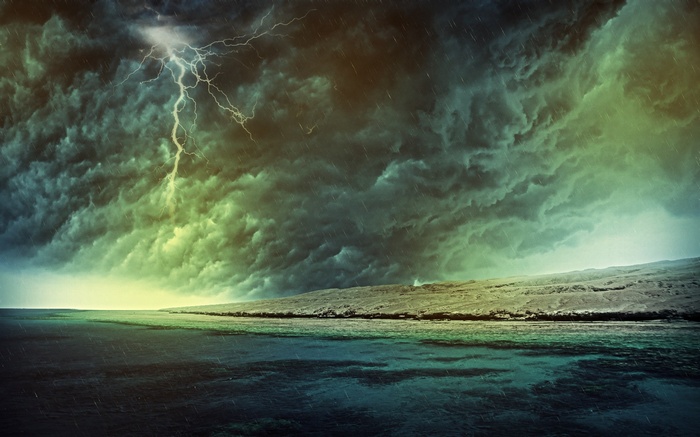 Lightning strikes over a stormy sea and land