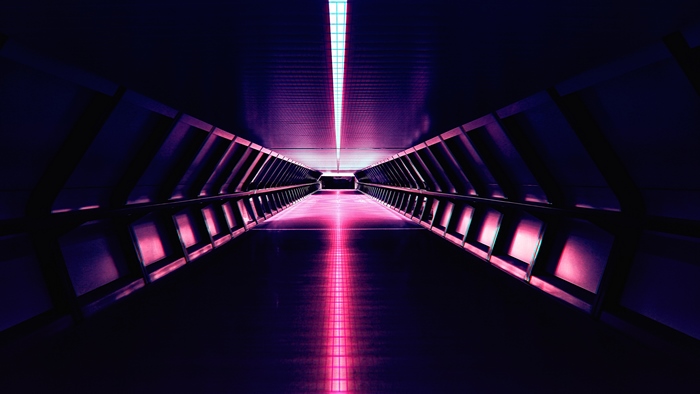 Futuristic tunnel with pink and purple neon lights