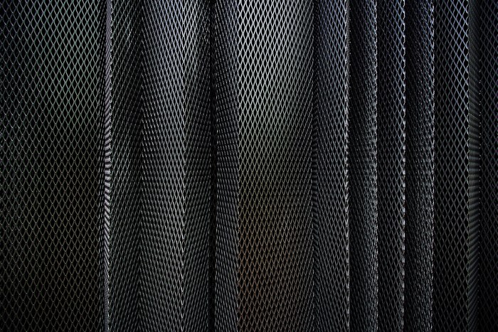 Dark metal expanded mesh pattern
