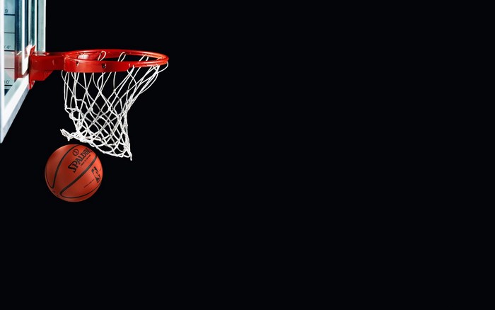 Spalding basketball near a hoop