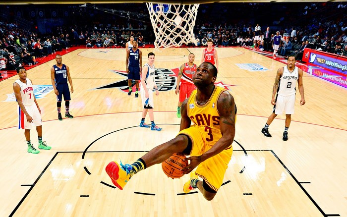 NBA Player Dunking in Vibrant Game Action