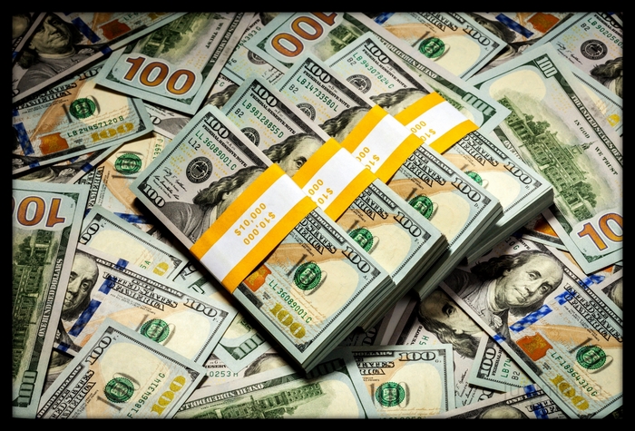 Stacks of 100 Dollar Bills