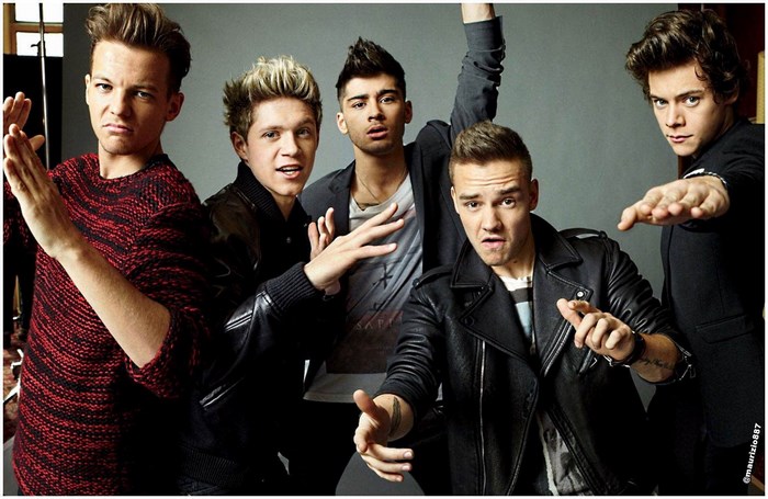 One Direction band members posing for a photo