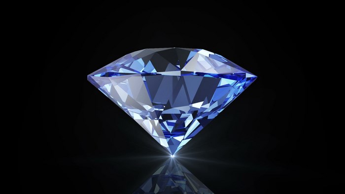 Blue diamond on black background