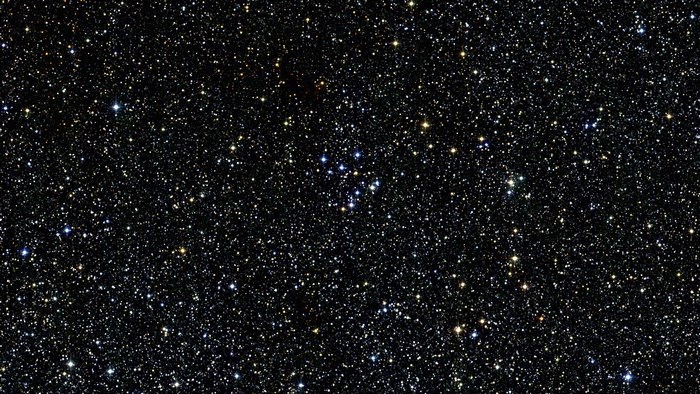 Starry night sky with star cluster