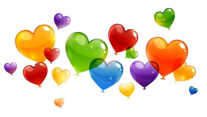 Colorful heart-shaped balloons floating