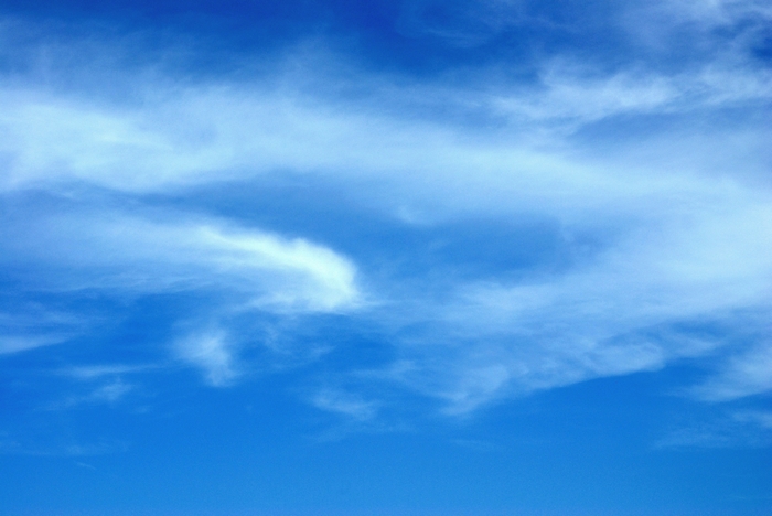 Blue sky with wispy clouds