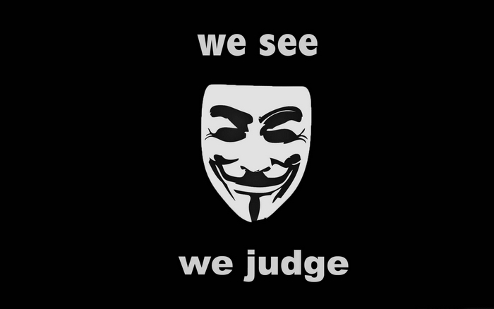 Anonymous mask with text 'we see we judge'
