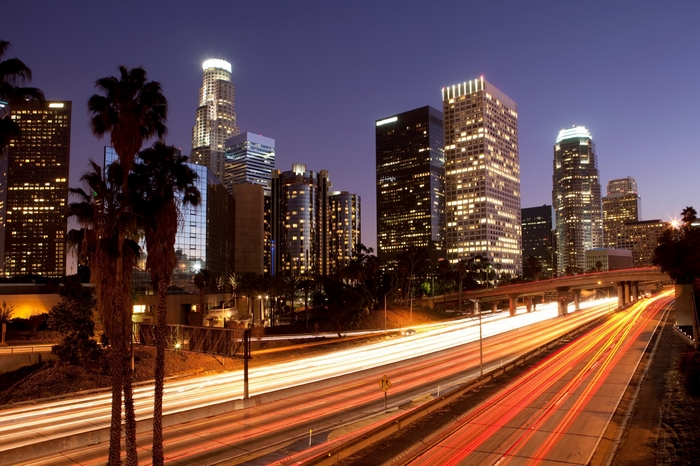 Los Angeles skyline at night with light trails
