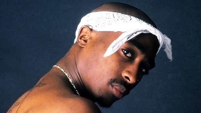 Tupac Shakur wearing a white bandana