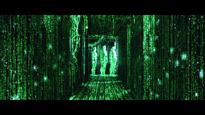 The Matrix digital rain with three figures