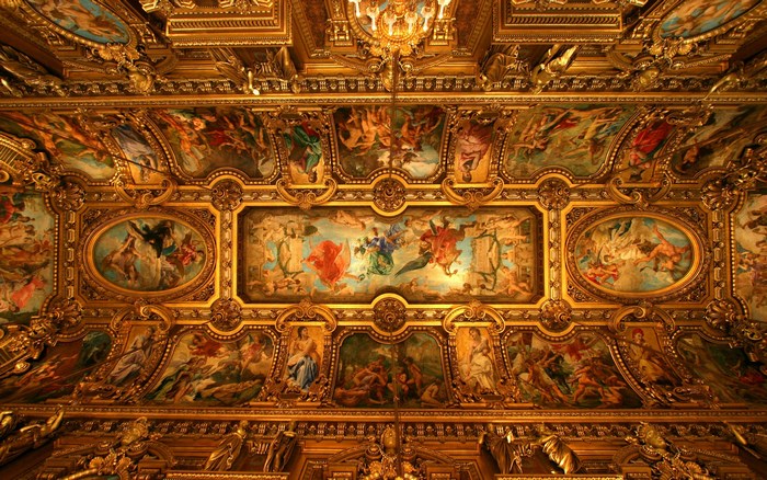 Ornate gilded ceiling with painted frescoes