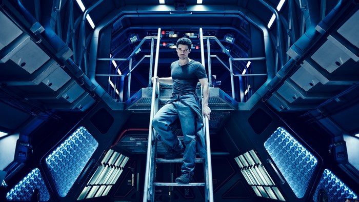 Man on stairs in The Expanse spaceship