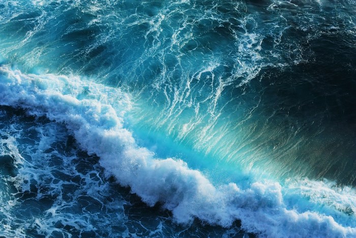 Ocean wave crashing with turquoise water