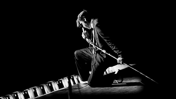 Elvis Presley performing on stage
