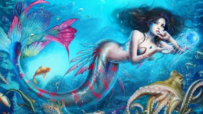 Mermaid with octopus and fish underwater