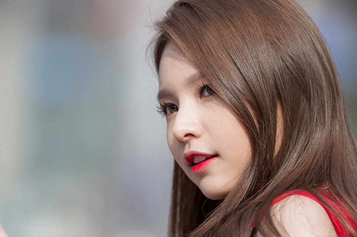 Korean girl group member in red top
