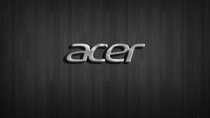 Acer logo on a dark wooden background