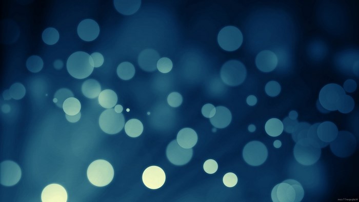 Bokeh lights on a dark blue background