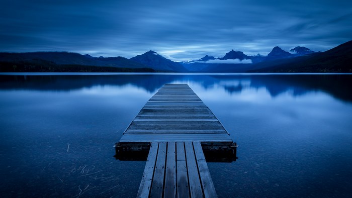 Serene Lake and Wooden Pier at Dusk 4K