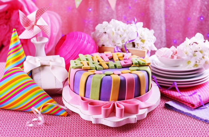 Birthday cake with party decorations