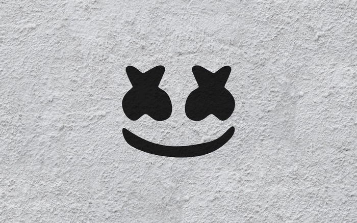 Marshmello logo on textured wall