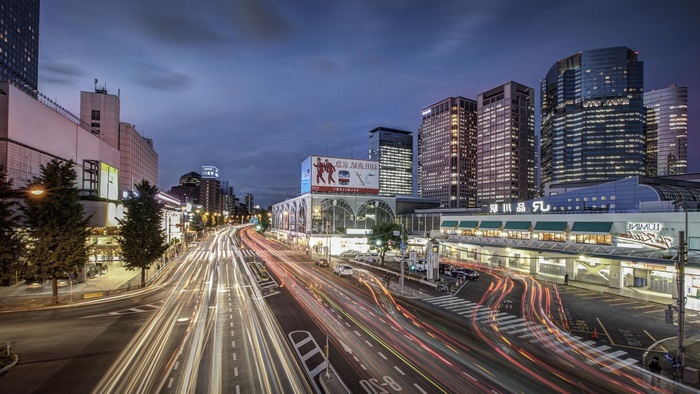Tokyo cityscape with light trails at dusk