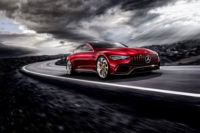 Red Mercedes-AMG GT 4-Door Coupe on a Winding Road