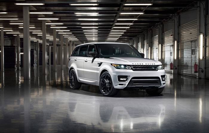White Range Rover Sport in a Garage