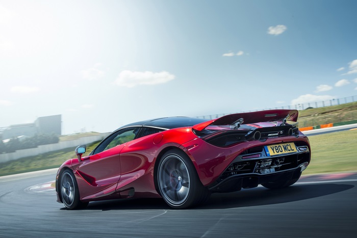 Red McLaren 720S on a Race Track