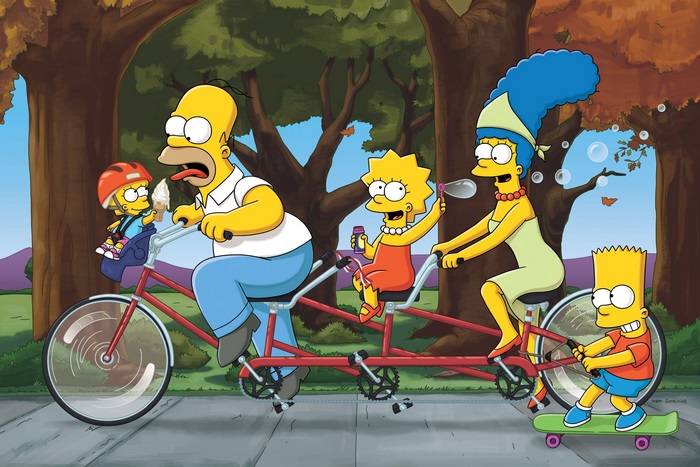 The Simpsons family on a tandem bicycle and skateboard