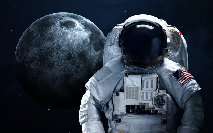 Astronaut in front of the Moon