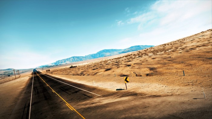 Desert highway landscape with mountains