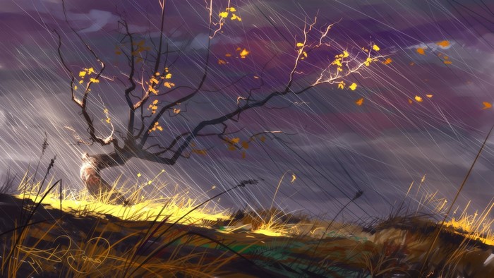 Tree in a storm with yellow leaves