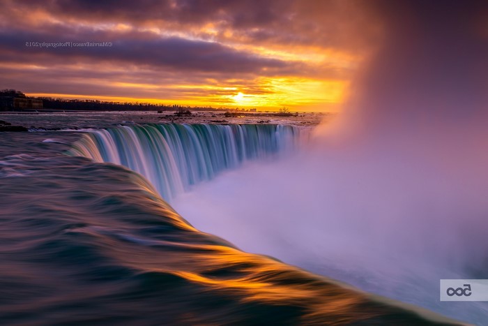 Niagara Falls at sunset with mist