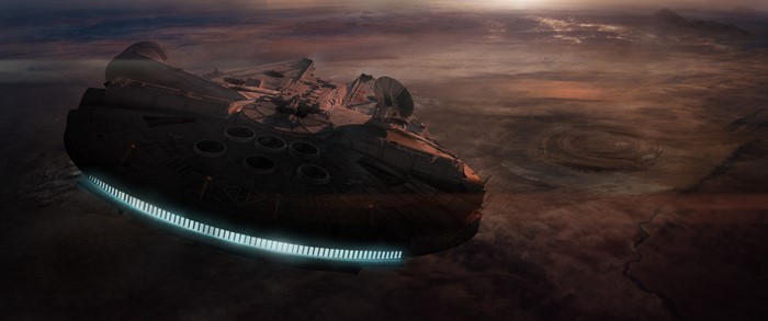 Star Wars Millennium Falcon flying over planet